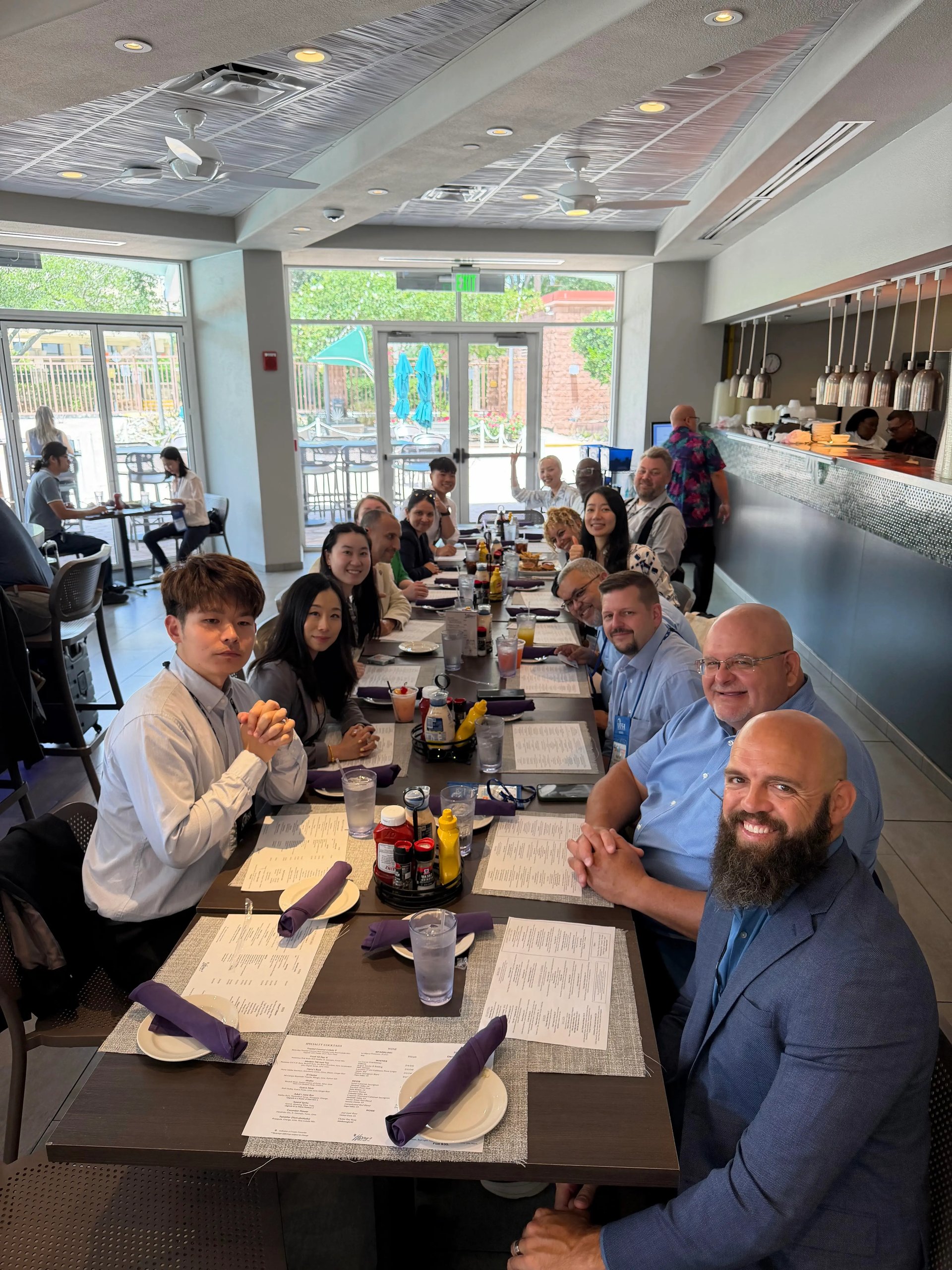 PDSOs, DSOs, and GoElite representatives participate in a roundtable lunch discussion on international student success.