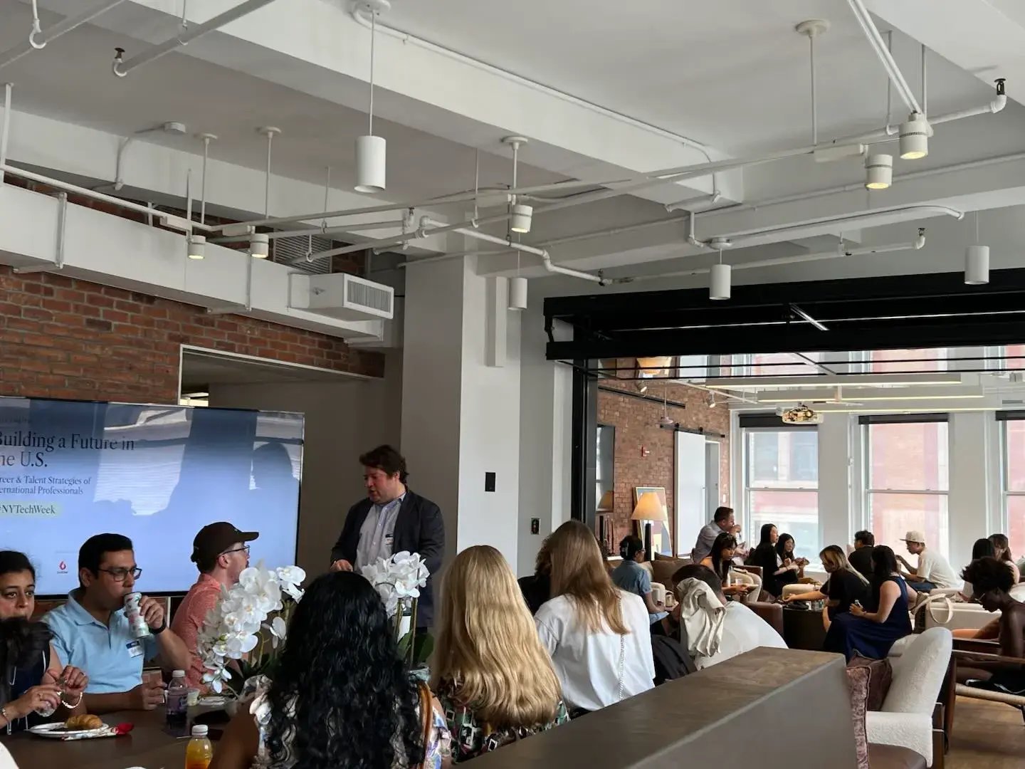 Professionals connect at NY Tech Week during GoElite's discussion on international talent strategies.