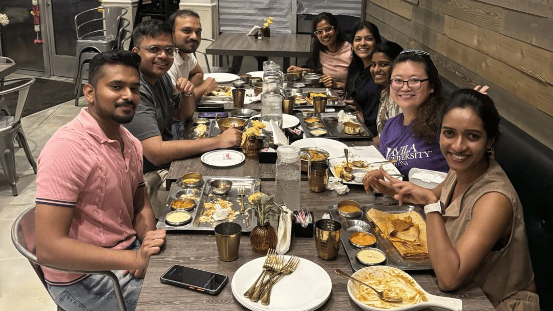 GoElite and Avila University Arizona students share a meal during the AUA residency weekend in Goodyear.