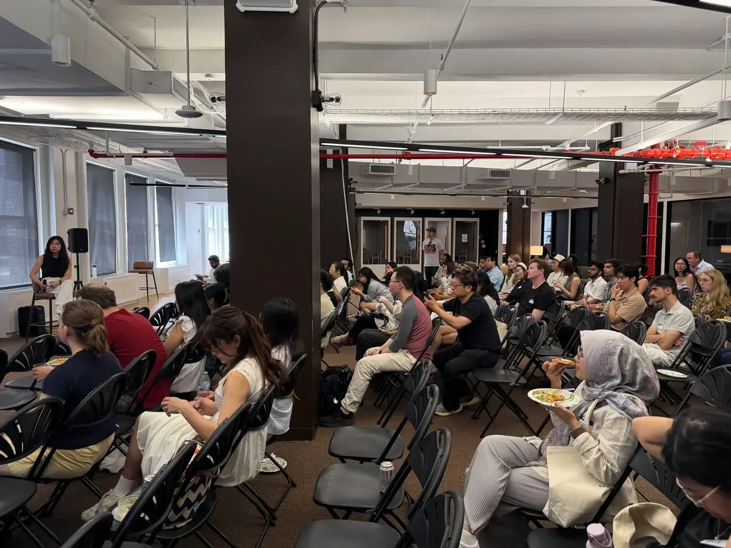 Professionals attend a NY Tech Week session on career and talent strategies for international professionals.
